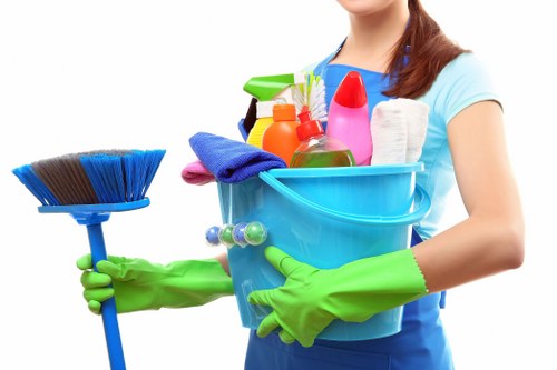 Carpet cleaning technician following safe working procedures